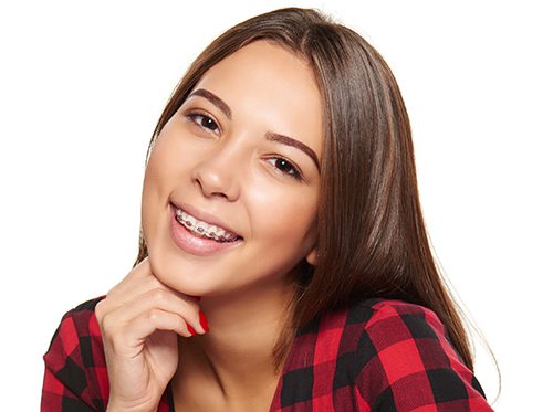 Young lady with braces smiling